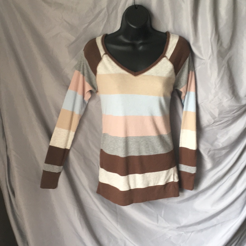 Creme, brown, light blue and pink, and grey fuzzy